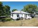 Small house with side yard and grill at 110 Sims Pkwy, Harrisburg, NC 28075