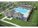 Community pool with clubhouse and ample lounge space at 526 Mountain View Dr, Monroe, NC 28110