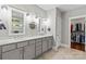 Elegant bathroom with double vanity, large mirror and walk-in closet at 6135 Chimney Bluff Rd, Lancaster, SC 29720