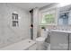 Bathroom with walk-in shower and gray vanity at 607 Ligon St, Shelby, NC 28150