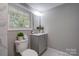 Main bathroom with vanity and toilet at 607 Ligon St, Shelby, NC 28150