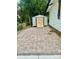 Backyard with patio, storage shed and landscaping at 607 Ligon St, Shelby, NC 28150