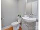 Small bathroom with toilet and vanity at 607 Ligon St, Shelby, NC 28150