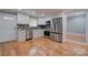 Modern kitchen, granite countertops, stainless steel appliances, hardwood floors at 607 Ligon St, Shelby, NC 28150