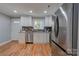 Modern kitchen with granite countertops and stainless steel appliances at 607 Ligon St, Shelby, NC 28150