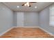 Bright bedroom with hardwood floors and window at 607 Ligon St, Shelby, NC 28150