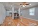 Bright dining room with hardwood floors and kitchen views at 607 Ligon St, Shelby, NC 28150