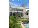 Modern concrete home with a view of the pool and patio at 3217 Maymont Pl, Charlotte, NC 28205