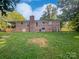Brick ranch house with a spacious backyard at 1525 Vanderlip Dr, Gastonia, NC 28052