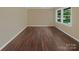 Bright living room with dark hardwood floors at 1525 Vanderlip Dr, Gastonia, NC 28052