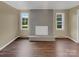 Living room with a grey brick fireplace at 1525 Vanderlip Dr, Gastonia, NC 28052