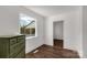 Bright bedroom with wood floors and window coverings at 412 E Jefferson St, York, SC 29745