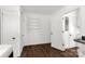 Bright hallway with hardwood floors and built-in shelving at 412 E Jefferson St, York, SC 29745