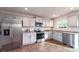 Modern kitchen with stainless steel appliances and granite countertops at 14232 Wilson Mac Ln, Charlotte, NC 28278