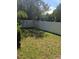 A small backyard with a white vinyl fence at 5720 Ebley Ln, Charlotte, NC 28227
