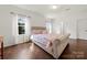 Bright bedroom with hardwood floors and neutral decor at 305 Redberry Ct, York, SC 29745