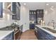 Modern kitchen with island and stainless steel appliances at 5055 Elm View Dr # 25, Charlotte, NC 28277