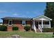 Brick ranch house with a covered front porch at 500 Doffin Ln, Gastonia, NC 28052