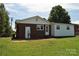 Brick and white sided home with patio at 500 Doffin Ln, Gastonia, NC 28052