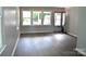 Spacious living room featuring wood-look floors and neutral walls at 500 Doffin Ln, Gastonia, NC 28052