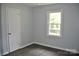 Cozy bedroom with a window and closet at 500 Doffin Ln, Gastonia, NC 28052