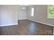 Simple dining room with light gray walls and wood-look floors at 500 Doffin Ln, Gastonia, NC 28052