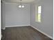 Bright dining area with neutral walls and wood-look flooring at 500 Doffin Ln, Gastonia, NC 28052