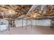 Unfinished basement with exposed pipes and a concrete floor at 335 Davidson Hwy, Concord, NC 28027