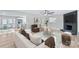 Open concept living room with kitchen view and fireplace at 335 Davidson Hwy, Concord, NC 28027