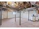 Unfinished basement with exposed pipes and a concrete floor at 335 Davidson Hwy, Concord, NC 28027