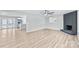 Open concept living room with kitchen and fireplace at 335 Davidson Hwy, Concord, NC 28027
