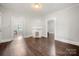 Living room with hardwood floors and fireplace at 225 Flint St, Charlotte, NC 28216