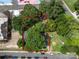 Aerial lot view of a house surrounded by trees at 225 Flint St, Charlotte, NC 28216