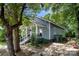 Gray house with green door and side yard at 225 Flint St, Charlotte, NC 28216