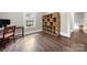 Home office with hardwood floors and built-in shelving at 225 Flint St, Charlotte, NC 28216