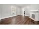 Living room with hardwood floors and fireplace at 225 Flint St, Charlotte, NC 28216