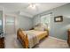 Guest bedroom with light walls and wood bed frame at 1447 London Dr, Rock Hill, SC 29732