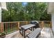 Wooden deck with picnic table and wooded backyard view at 1447 London Dr, Rock Hill, SC 29732