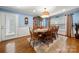 Bright dining room with hardwood floors and a large window at 1447 London Dr, Rock Hill, SC 29732