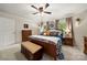 Main bedroom with wood furniture and neutral color scheme at 1447 London Dr, Rock Hill, SC 29732