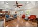 Open living room with hardwood floors, two sofas, and view into kitchen at 1447 London Dr, Rock Hill, SC 29732