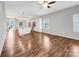 Open living room with hardwood floors and views into the kitchen at 24601 Blue Heron Cir, Lancaster, SC 29720