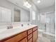 Double vanity bathroom with a shower and tub at 24601 Blue Heron Cir, Lancaster, SC 29720