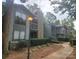 Apartment building with walkway and landscaping at 5020 Sardis Rd # N, Charlotte, NC 28270