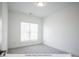 Bright bedroom with a large window and grey carpet at 222 Gilead Rd, Huntersville, NC 28078