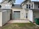 Rear view of the house, showing patio and storage at 9128 Treyburn Dr, Charlotte, NC 28216