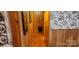 Long hallway with wood walls and flooring at 102 Aderholdt Rd, Bessemer City, NC 28016