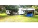 White ranch home with carport and fenced backyard at 102 Aderholdt Rd, Bessemer City, NC 28016