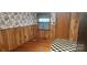 Small dining area with wood walls and flooring at 102 Aderholdt Rd, Bessemer City, NC 28016