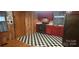 Kitchen with red cabinets and checkered floor at 102 Aderholdt Rd, Bessemer City, NC 28016
